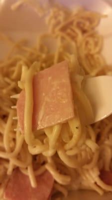 Real carbonara has eggs, cheese, bacon, and black pepper. This has a spoiled  ranch like substance and deli ham...