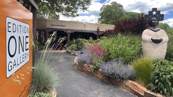 Edition ONE Gallery is located in the heart of Canyon Road. Featured here is Estella Loretto's monumental bronze, "Earth Mother".