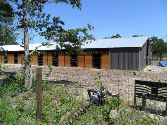 Horse barn with a metal roof