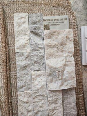 Gorgeous marble stacked stone e used for our entry, outdoor kitchen, and firepit surround.