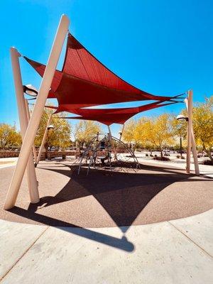 Kids climbing thing next to the parking lot from Tropicana Avenue