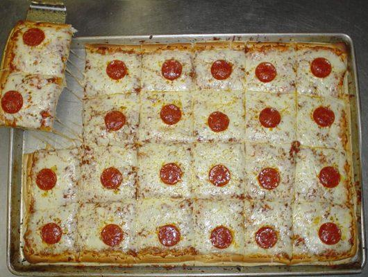 A full 24-cut sheet of our   pizza.