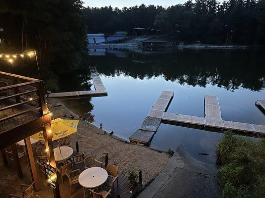 View of beach and docks after sunset.