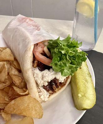 Chicken Salad Wrap with homemade fries and a pickle.