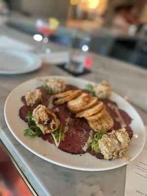 Beef carpaccio with oysters