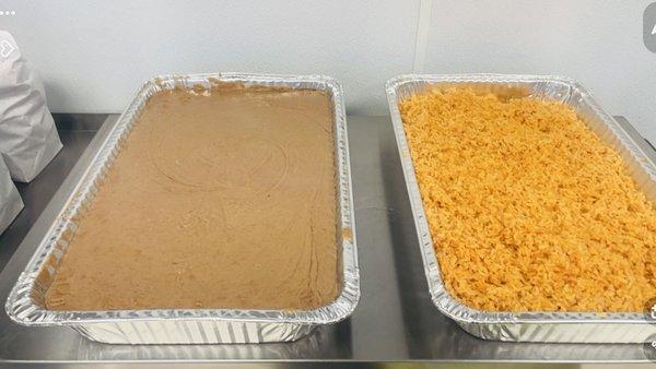 Large trays of rice and beans for  any ocasión