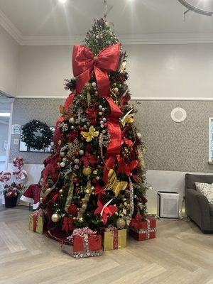 Gorgeous Christmas tree and decoration in lobby with a hint of cinnamon in the air making everyone's heart smile.