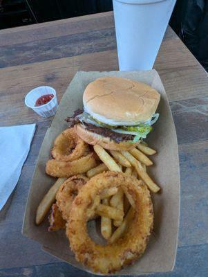 Smash burger with half onion rings and fries