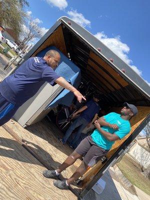 Movers packing the truck