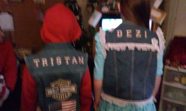 Blinged up blue jean vest with names on back