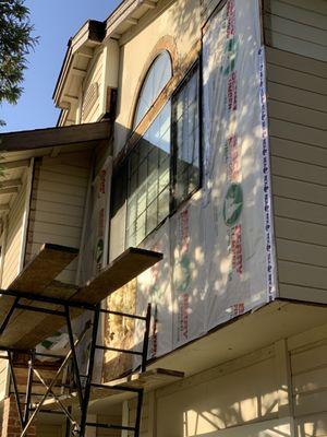 Siding replacement in progress