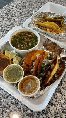 Birria tacos, chicken and carnitas street tacos.