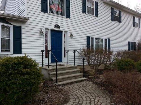 Custom Made Solid Iron Railings On Precast Concrete Front Steps