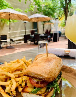 Patio area, spacious, clean.  And my scrumptious fried shrimp sandwich.