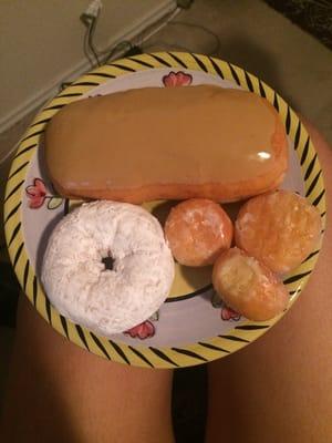 Bavarian filled maple donut, powdered sugar, and donut holes