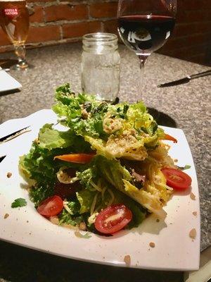 Thai steak salad, with carrots, mango, noodles, cilantro & basil, sweet chili, grilled steak, tomatoes & freshly roasted & crushed peanuts.