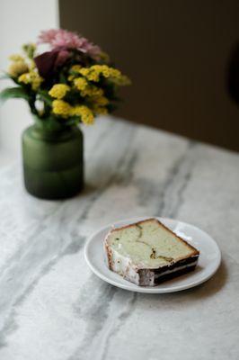 Pistachio poundcake with rosewater creme fraiche icing~ made in house by Chef Rosanne