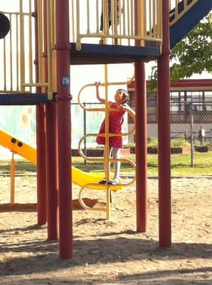 My little monkey playing at the park after school