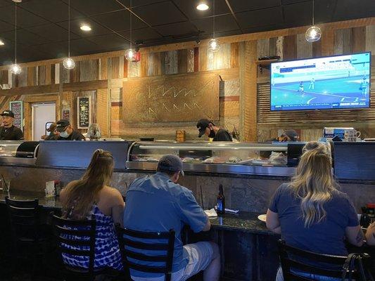 You can eat at a booth or at the "bar" area.