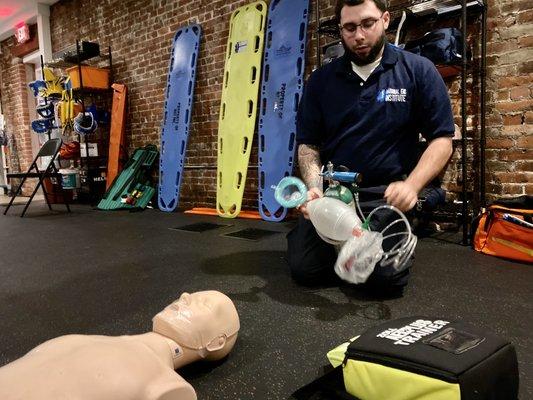 A student at NEI- New Bedford performing CPR.