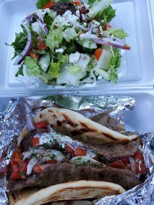 Gyro wrap with salad.