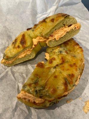 Spinach artichoke bagel with sun dried tomato garlic cream cheese