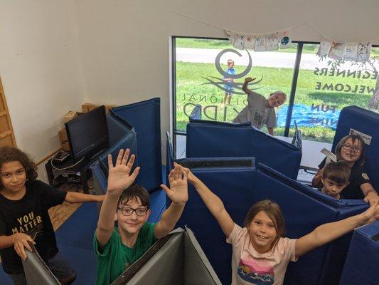 Kids enjoy building mat forts!