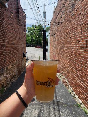 Peach tea with popping lychee bubbles