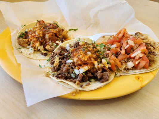 Beef, pork and chicken tacos