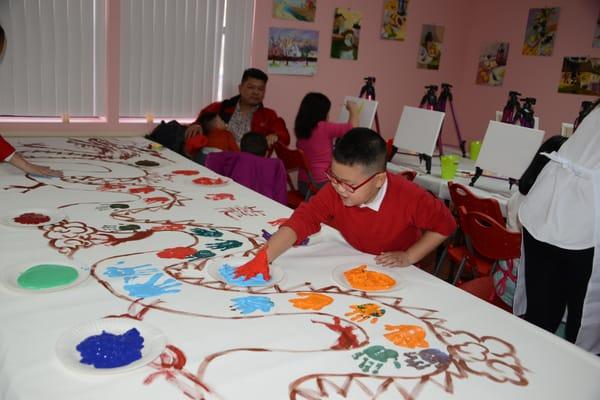 have a lot of fun ! hand printing painting --create your own art on the dragon shape