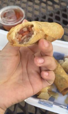 First bite of undercooked pork egg roll