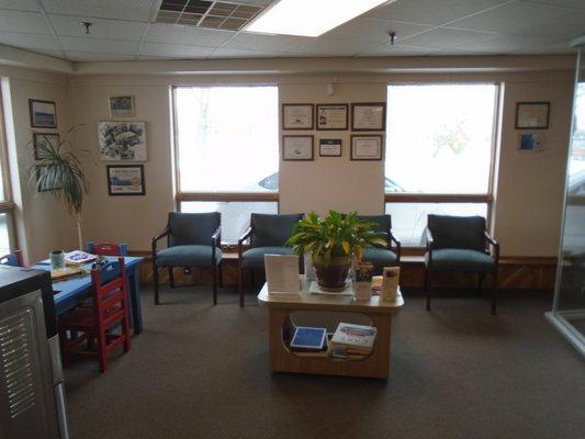 Clean waiting area with a children's play table