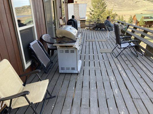 This is the lovely, well appointed and well maintained deck that overlooks the lake.