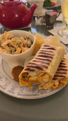 Buffalo chicken wrap with a side of pasta salad