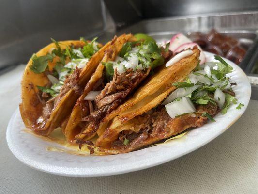 Unos ricos tacos de birria