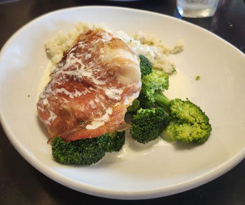 Prosciutto wrapped cod with risotto and broccoli