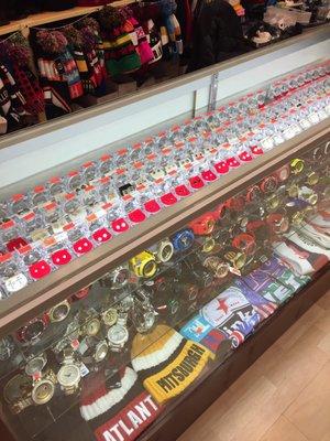 Large selection of earrings and watches