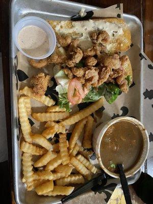 Half fried crawfish tails poboy, chicken & sausage gumbo and fries