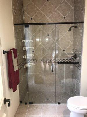 FRAMELESS SHOWER ENCLOSURE