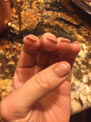 Dried for twenty minutes sprayed with spray that they recommended. Crooked, thick nails. Had asked for short rounded to pointed nail.