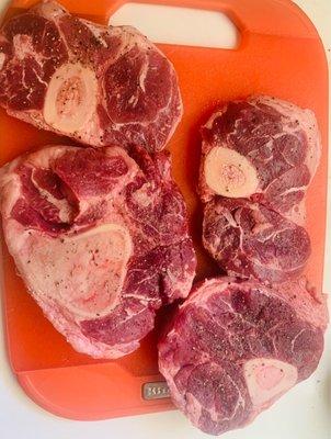 Prepping beef shanks with simple salt and pepper.  One beef shank bone was huge with no marrow. Great marbling.