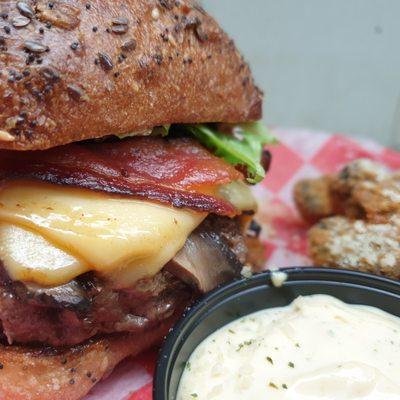 1/2lb Wagyu beef burger, with smoked gouda, pecanwood smoked bacon and and heritage greens on our multigrain ciabatta bun