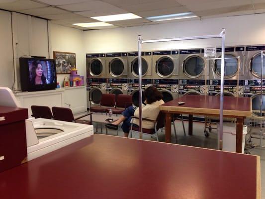 You can watch a show (or at least sit) while waiting for your wash.