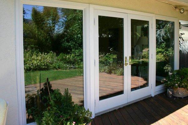 Lighten up a room with french door and sidelight combination.