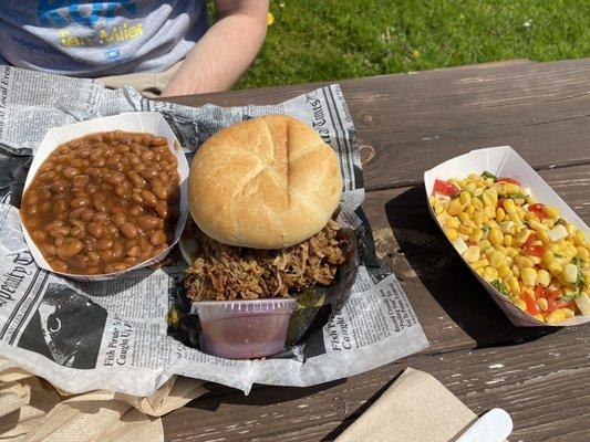 Baked beans, pulled pork sandwich, caprese corn salad