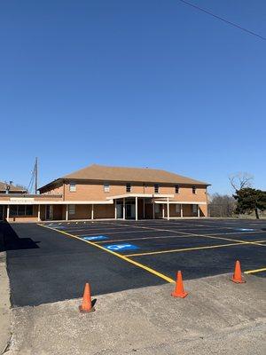 Parking Lot Sealcoating and Striping by Texas Blacktop Service.