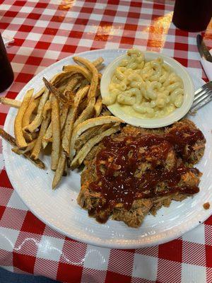 Pulled pork with hot bbq sauce added; mac & cheese, french fries