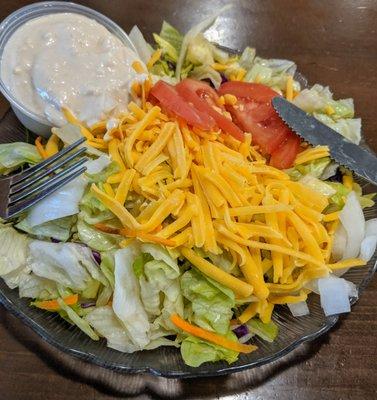 Salad with *plenty* of cheese