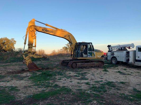 Excavator that demo the old building on my property.