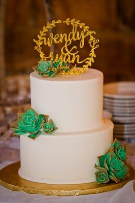 Our two-tier, glutenless wedding cake complete with sugar-sculpted succulent flowers. Perfect for us. Exactly what we wanted.